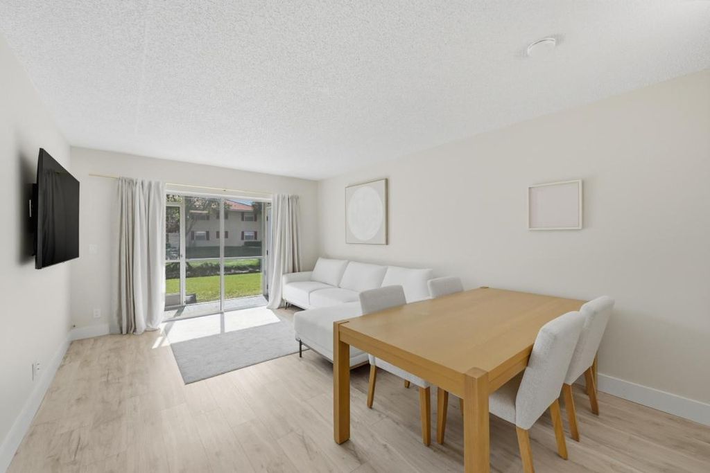 Photo of 3648 N University Drive #Building 3, Coral Springs, FL 33065 (MLS # R11151925)