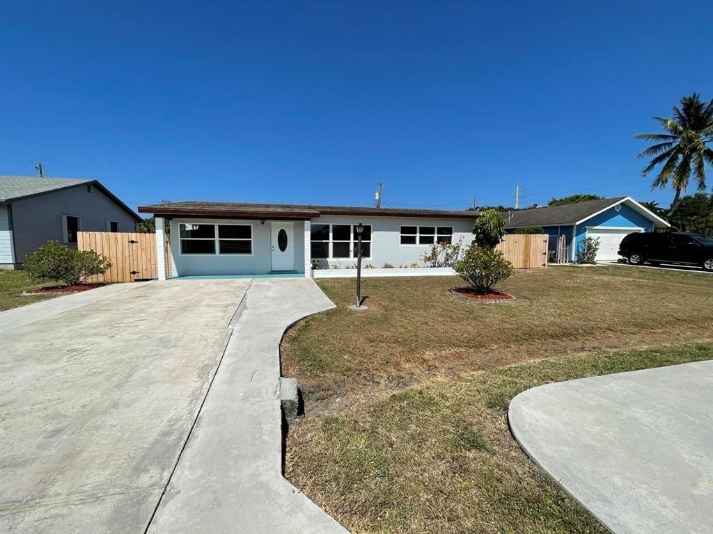 Photo of 5791 SE Laguna Avenue, Stuart, FL 34997 (MLS # R10721277)