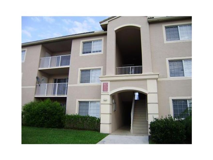 Spacious 3bedroom/2bathroom unit in a desirable gated community.  All tiles flooring through-out.  Ground floor.  Open patio with storage room.  Full-sized washer & dryer in unit.  Across street from Monarch High School.  Good schools district.  Convenient location.