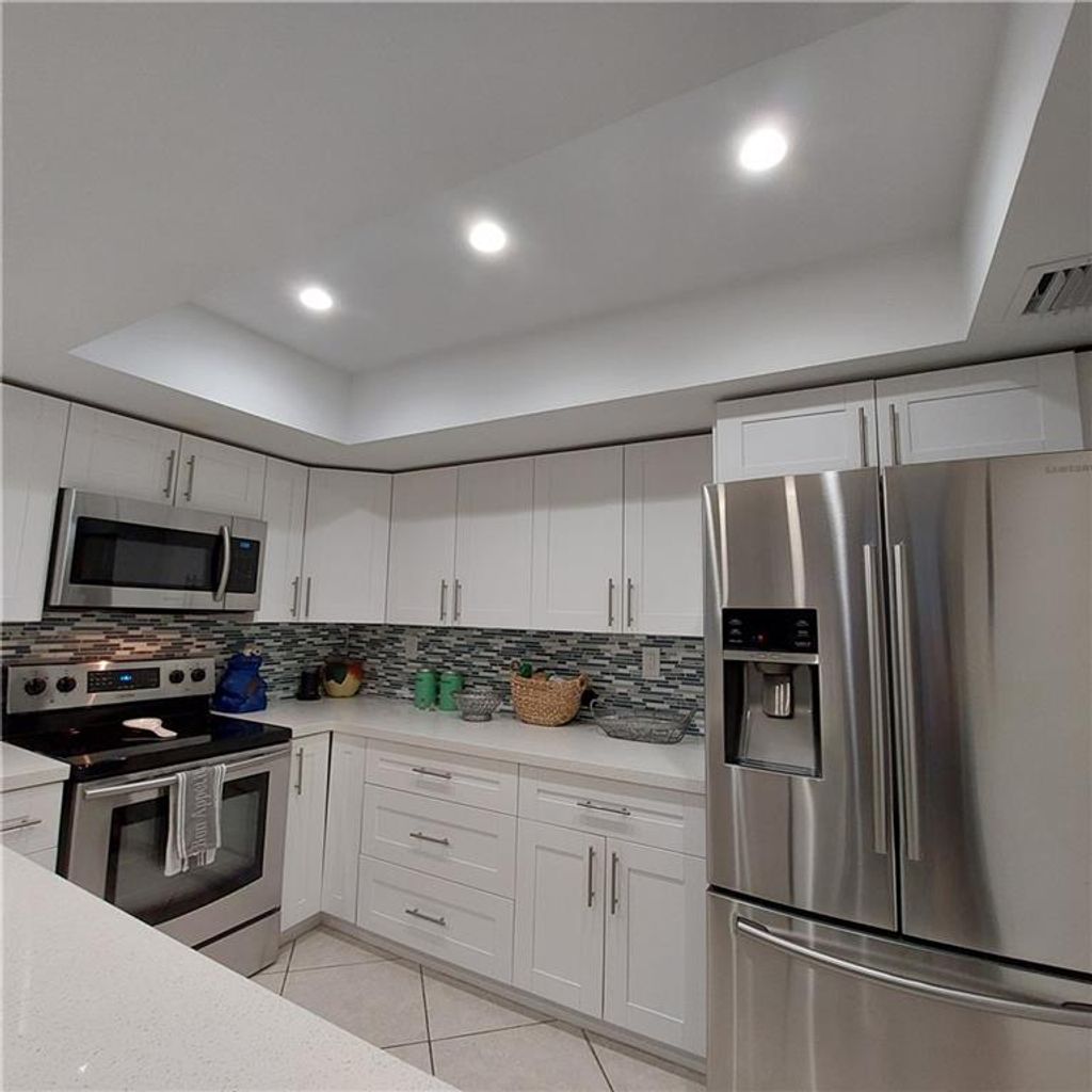 Photo of 5290 Buckhead Cir #1020, Boca Raton, FL 33486 (MLS # F10303319)