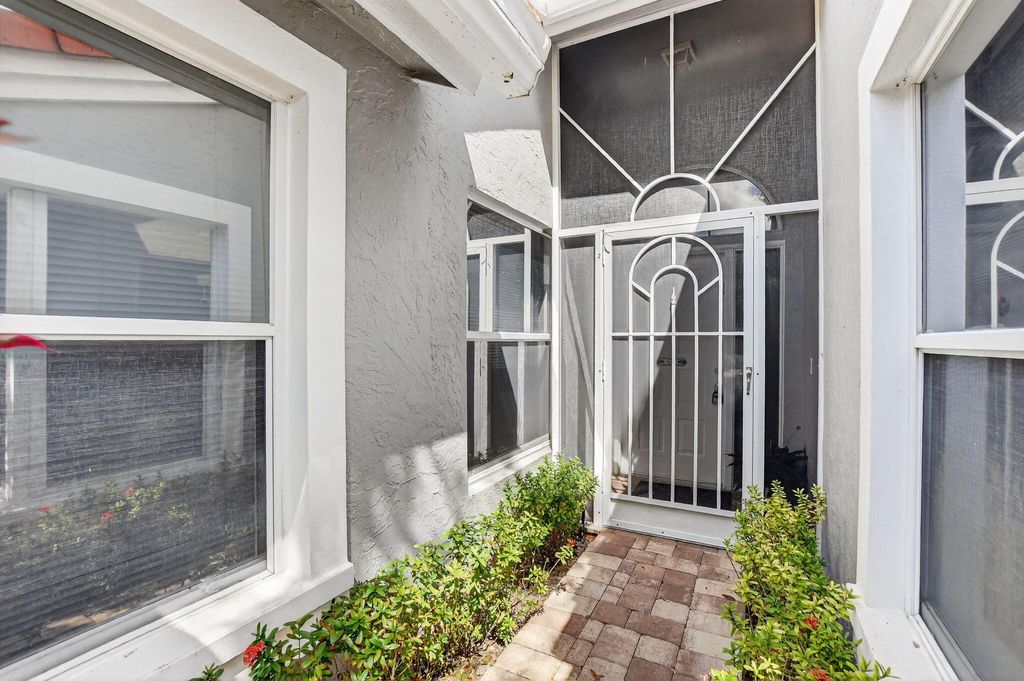 Photo of 7203 Summer Tree Dr, Boynton Beach, FL 33437 (MLS # B26000869)