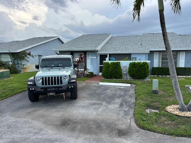 Please see this amazing home right away ! It is the best home in the area ! Move in and go to bed, nothing to do !!
All new flooring, new appliances, new roof, AC only a few years old, All new electrical box inside and outside. This home has French doors that lead to a huge outside screened patio with brand new fans that have lights. This leads out to a huge outside patio with privacy plants and overlooks a huge community back yard. Walk in closets, updated baths and full size washer and dryer. Come home and relax in this peaceful and warm community. Great neighbors and a great community. Go down the street and take a dip in the pool or use the community building for your big parties. As a Bonus, Accordian Shutters on all windows and Sliding glass doors. Minutes from Beach and dining.