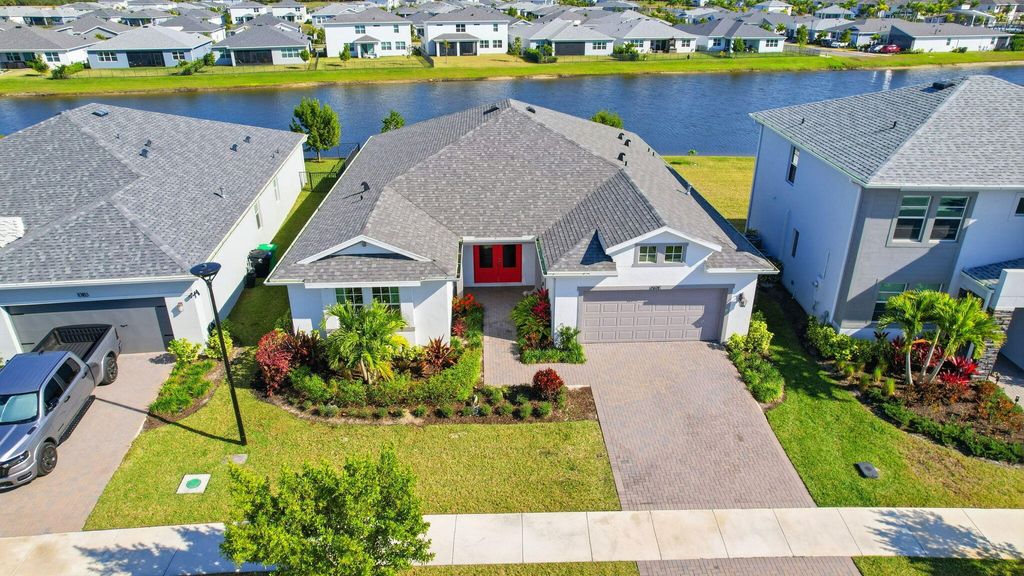 Photo of 10191 SW Sw Orana Dr, Port Saint Lucie, FL 34987 (MLS # R11159611)