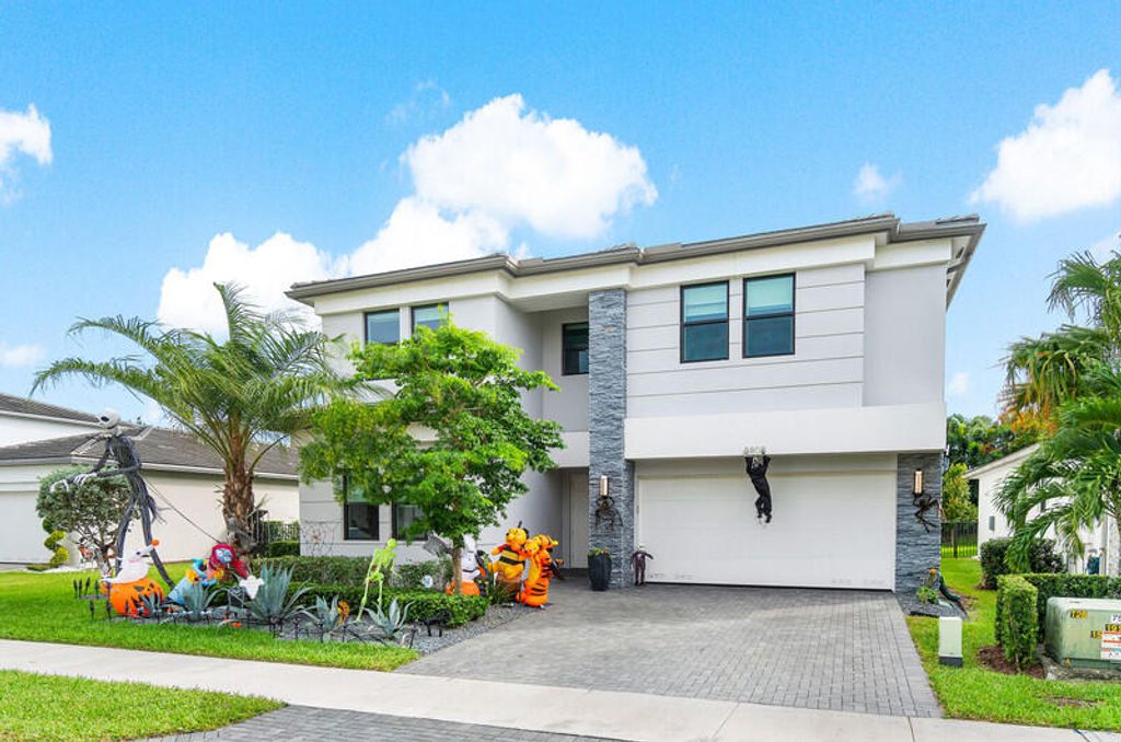 Photo of 8808 Quiet Inlet Lane, Boca Raton, FL 33496 (MLS # R11031893)