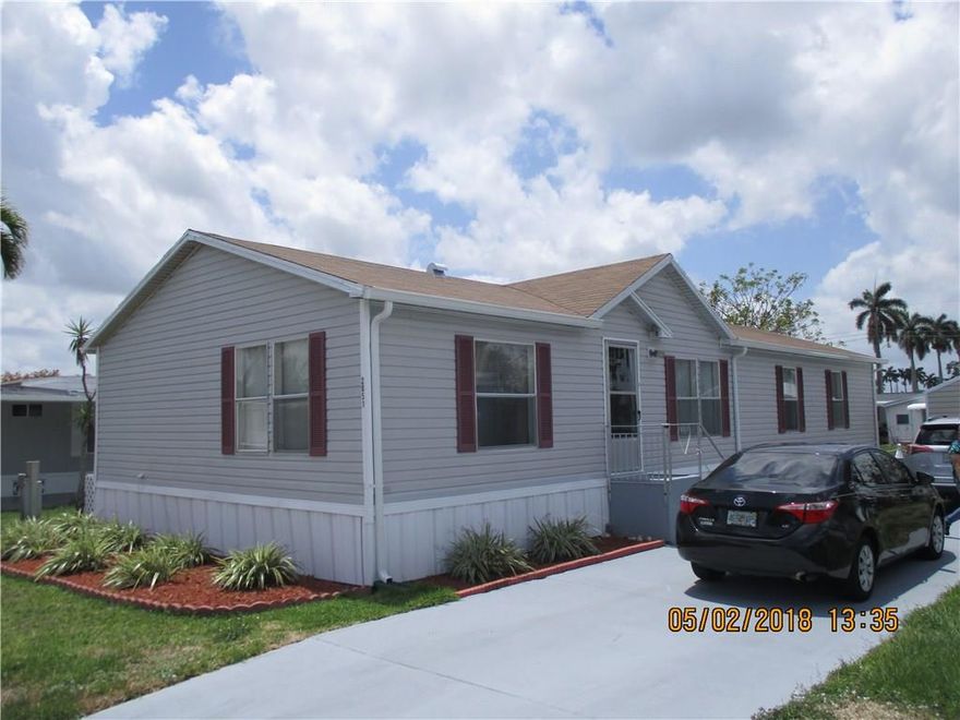 Beautiful rare 4 bedroom double in the best Section of Park City Estates situated on the canal which allows for more privacy. This home also Features newer floors, vanities, fans and appliances in the past few years. The roof was replaced in April of 2018 and the A/c was replaced approximately year and a half ago. The community features three clubhouses, three pools, 14  championship shuffleboard courts and much more. This home wont last long!!