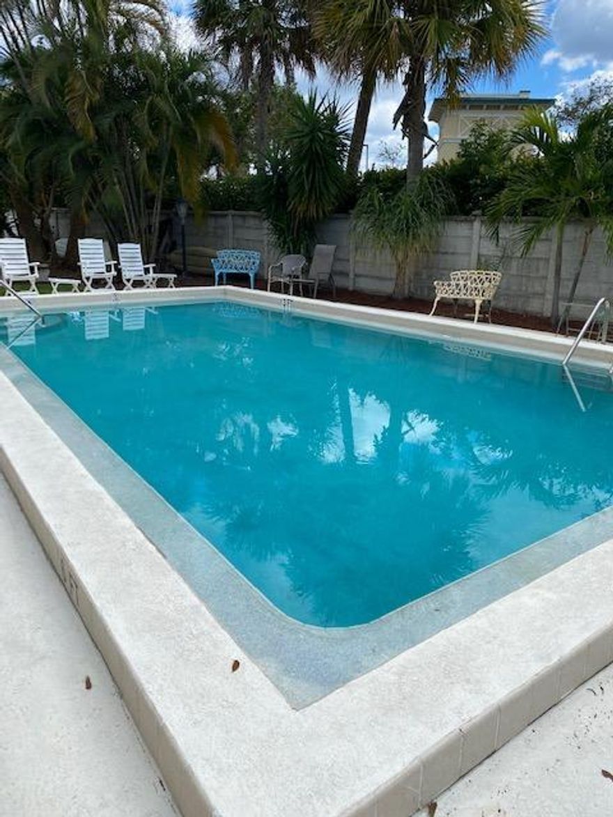 Great Condo in the Heart of N Palm Beach located on the Erman River  2 BR 1.5 BA Freshly Painted, & Tiled Throughout, Clean & Quiet ~ Community Pool and Dock ~Tenant occupied ~ Schedule on Line