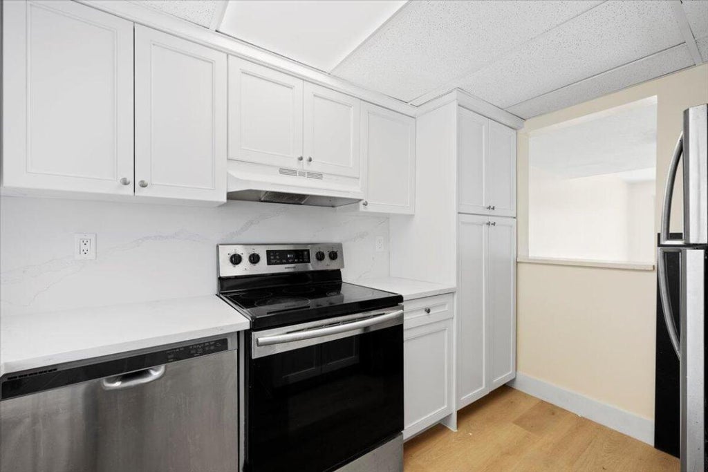 Photo of 3666 Pinehurst Drive #C, Lake Worth, FL 33467 (MLS # R11068806)