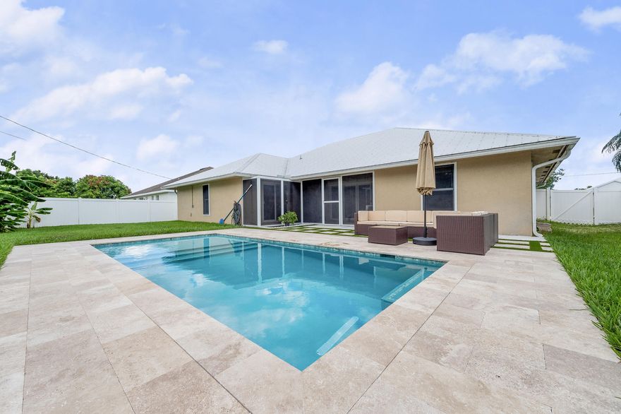 Modern Pool Home in Prime Port St. Lucie Location - Move-In Ready! Discover the perfect blend of comfort, style, and convenience in this beautifully maintained 3-bedroom, 2-bathroom single-family home boasting 2,080 sq. ft. of living space. Built in 2019 and located just minutes from I-95 off Becker Rd., this home offers quick access to Martin County, top-rated schools, shopping, dining, and the stunning Treasure Coast beaches. Step inside to an inviting open floor plan filled with natural light, enhanced by impact windows and doors for peace of mind. The gourmet kitchen is a chef's dream, featuring stainless steel appliances, granite countertops, and plenty of cabinetry for storage. Enjoy year-round outdoor living with your beautiful saltwater pool!