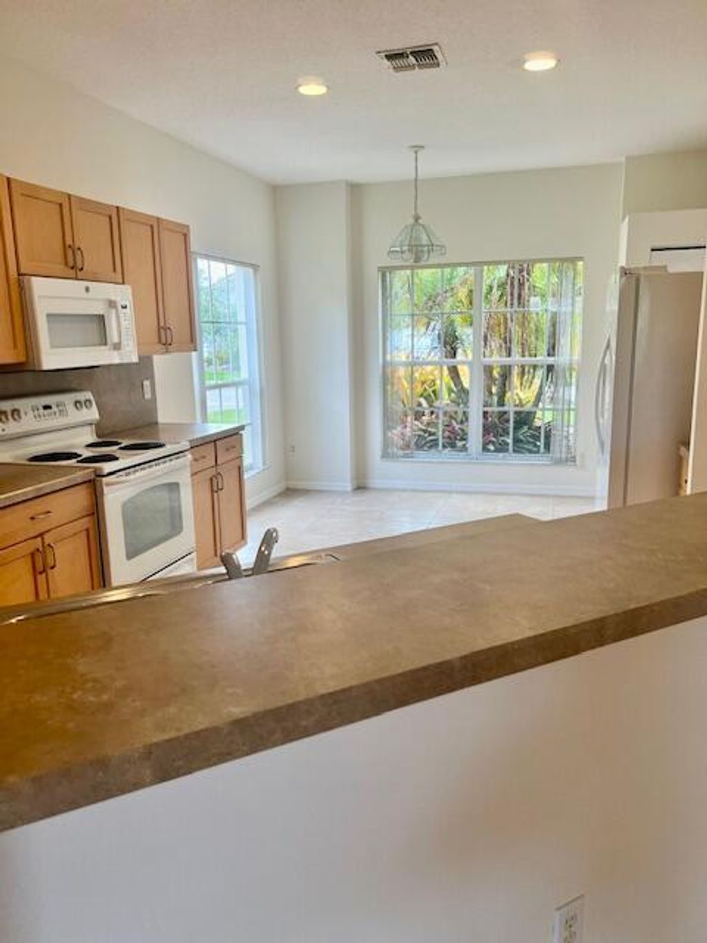 Photo of 9642 SW Lindale Trace Boulevard, Port Saint Lucie, FL 34987 (MLS # R10998410)