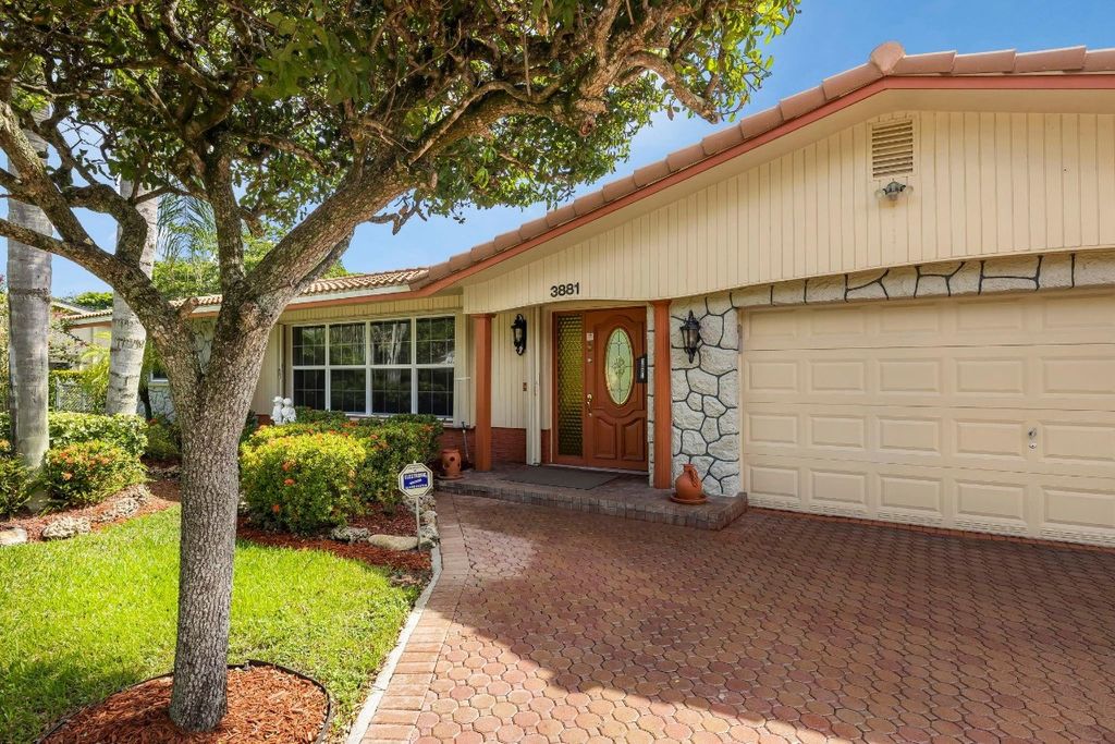 Photo of 3881 NW 100th Avenue, Coral Springs, FL 33065 (MLS # F10518214)