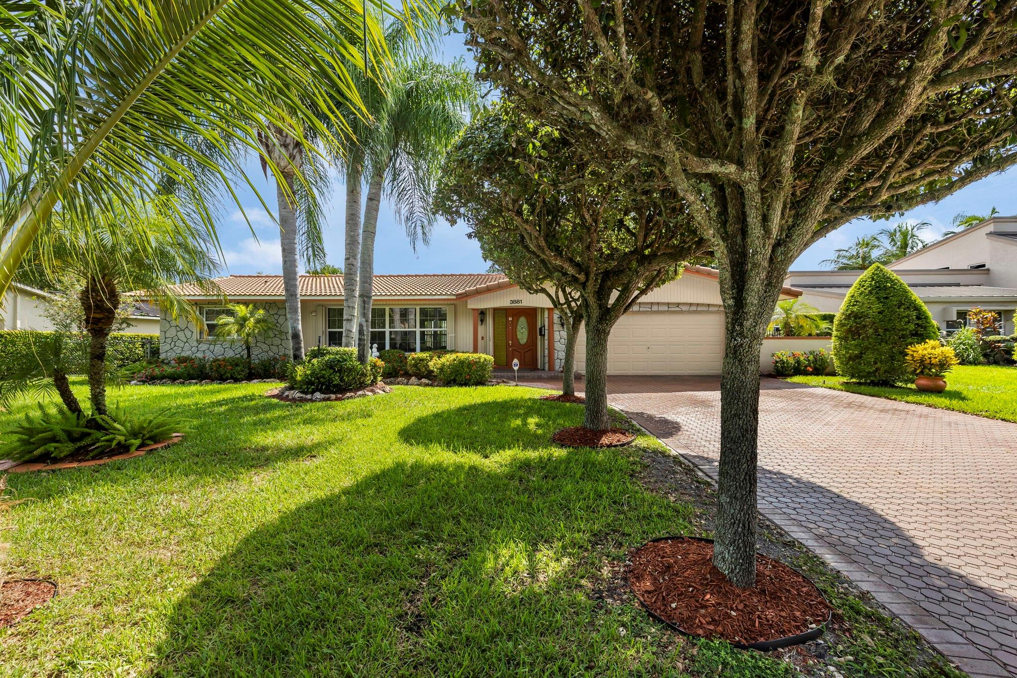 Beautiful home located in the desirable Coral Springs Lakes area, just minutes from Downtown Coral Springs. Nestled on a quiet street, this property features a total of 4 bedrooms and 3 bathrooms, including a private in-law quarter with its own bedroom, TV room, and bathroom. Enjoy serene canal views from the new deck patio surrounded by ornamental plants in the backyard.
Additional features include impact windows, hurricane shutters, impact-rated garage door, water softener system, tile flooring throughout, newer electrical panel with an additional panel for generator use, newer appliances, and a 2-year-old roof. The master bathroom offers a relaxing jacuzzi. The home also has pavers on the driveway and back patio, as well as two central A/C units.
Seller financing available.