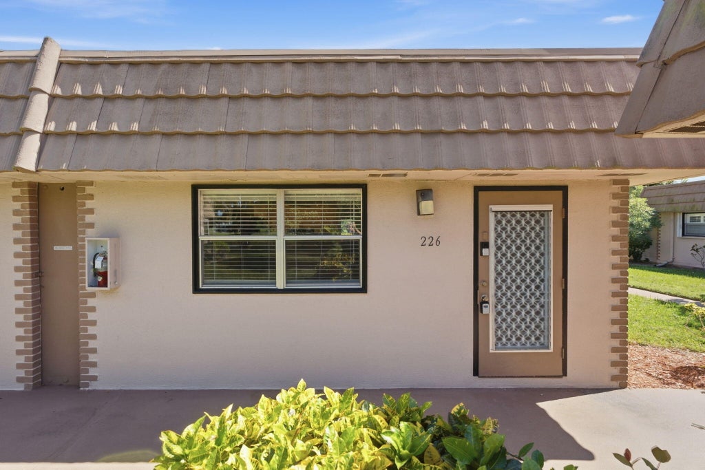 Photo of 226 Seville Boulevard, Delray Beach, FL 33446 (MLS # B26091375)