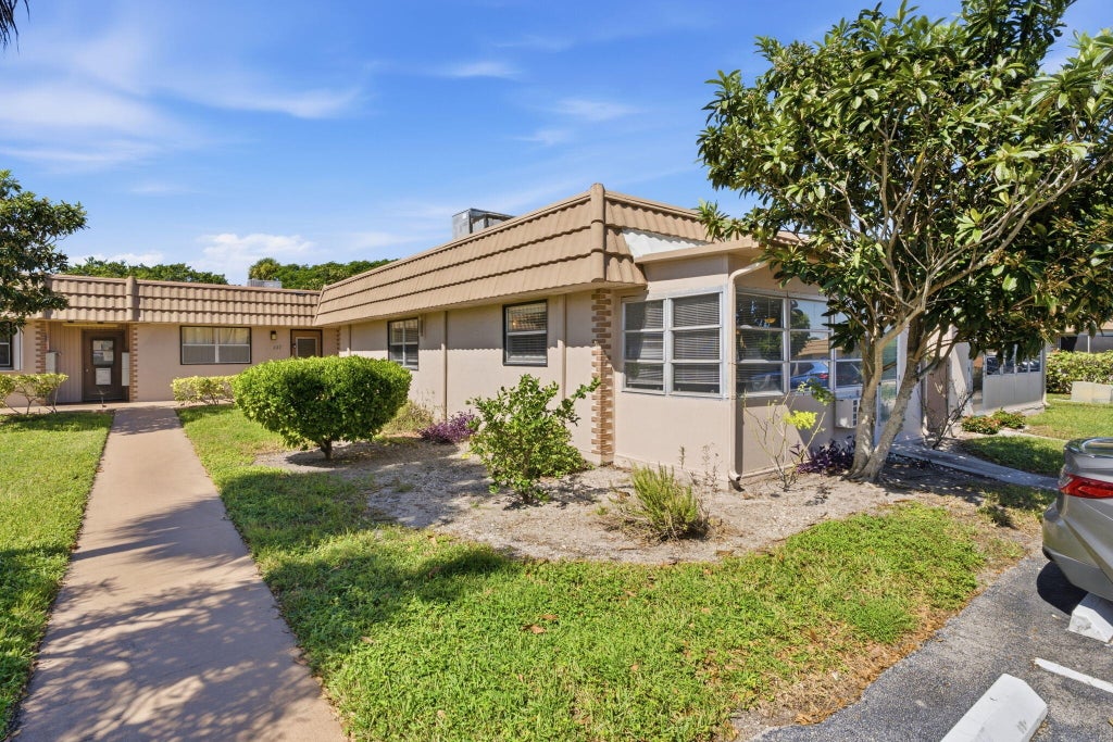 Photo of 226 Seville Boulevard, Delray Beach, FL 33446 (MLS # B26091375)