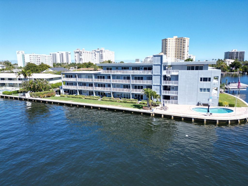 Photo of 1201 S Riverside Drive #208, Pompano Beach, FL 33062 (MLS # B26026304)