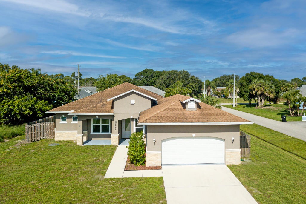 Photo of 3902 SW Laffite Street, Port St Lucie, FL 34953 (MLS # R10897253)