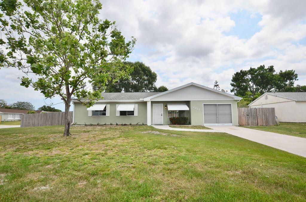 Photo of 2013 SE Triumph Road, Port Saint Lucie, FL 34952 (MLS # R10987356)