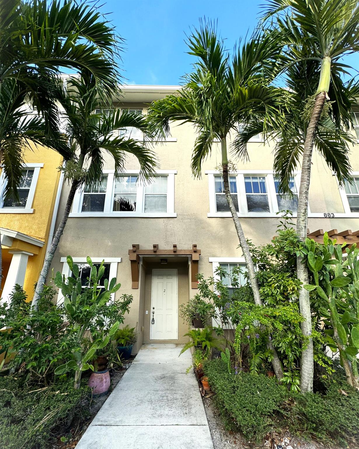 2 bed 2.5 bath townhome with 1st floor office near everything! Attached garage with storage areas and additional driveway parking. Great interior building in the heart of the community. Only 5 minutes from downtown West Palm, I-95, and PBI airport. Walk across the street to the new Outlet Shops, Whole Foods, Target, and multiple restaurants. Community amenities include 24hr manned gate w/ nightly roving patrol, HUGE lakeside pool, recently renovated gym and lakeside jogging track. Rent includes fiber optic cable & internet service with wi-fi, water, and trash removal.