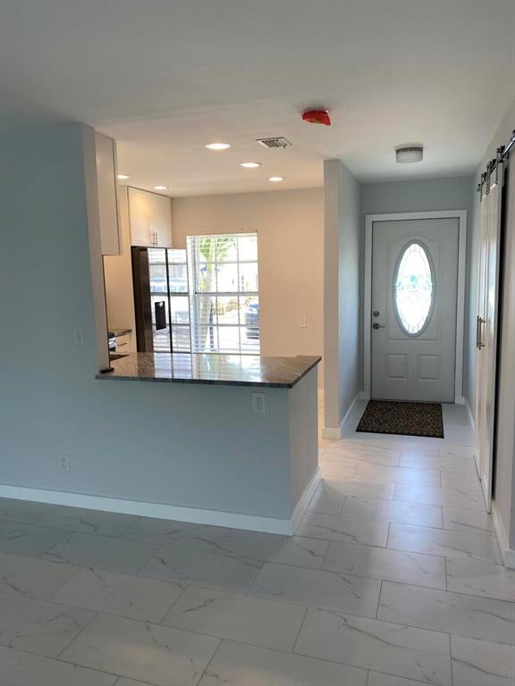 Photo of 431 Bennington Lane Ln, Lake Worth Beach, FL 33467 (MLS # R10727174)