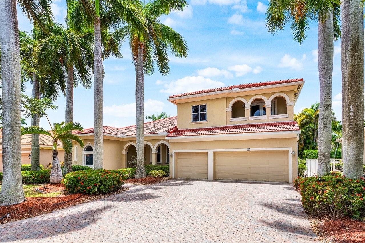 Just Listed in Venetian Isles! Luxury Lakeside Living! Welcome to this stunning Mediterranean style home located in this prestigious guard gated community. Nestled in an upscale enclave surrounded by a serene lake, this beautifully updated residence offers the perfect blend of sophistication, comfort, & style. Step inside to discover expansive windows, soaring ceilings, custom built-in closets & a modern kitchen featuring sleek finishes & stainless steel appliances—ideal for both everyday living & entertaining. Additional highlights include impact windows throughout, updated flooring, along with a newer roof & A/C system. The open & airy floor plan flows effortlessly to the expansive backyard oasis, where you’ll find a beautiful pool & spa—perfect for relaxing or hosting family & friends.