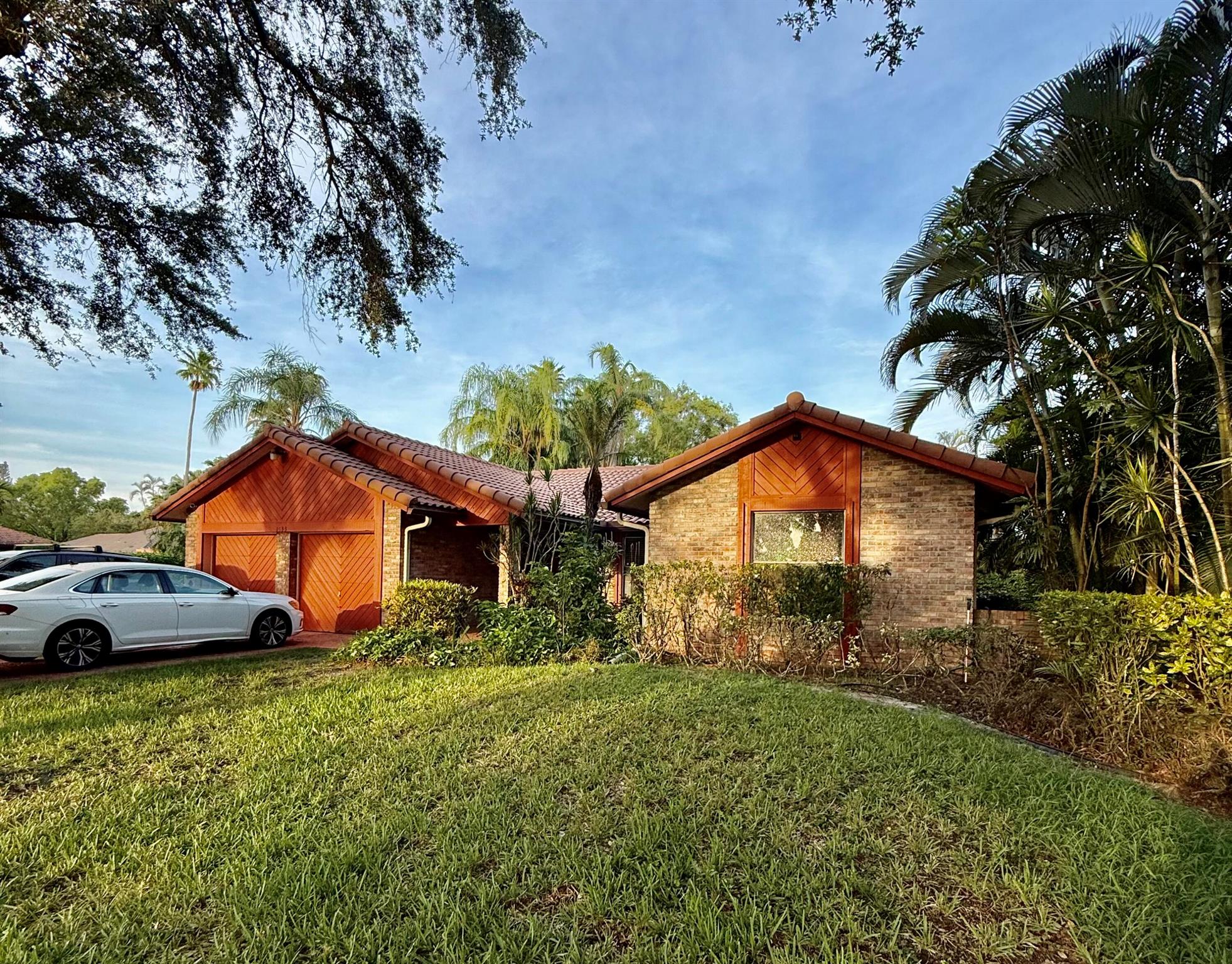 Check out this GREAT OPPORTUNITY!! This 4 Bed 2 Bath Single Family Home w/2 car garage and plenty of space can be yours! This home features an open concept kitchen & family room, formal living and dining room (convertible to Office/Den space), large screened pool and patio area, perfect for entertaining. Kitchen and floor remodeled in 2020 -tile throughout-. Corner lot on canal, neighbors only on 1 side. House is perfect for those that want room! Minutes from Sawgrass Expressway, Coral Square Mall, Coral Springs Aquatic Complex, shopping, dining and many more! Investors welcome, no rental restrictions!!!.