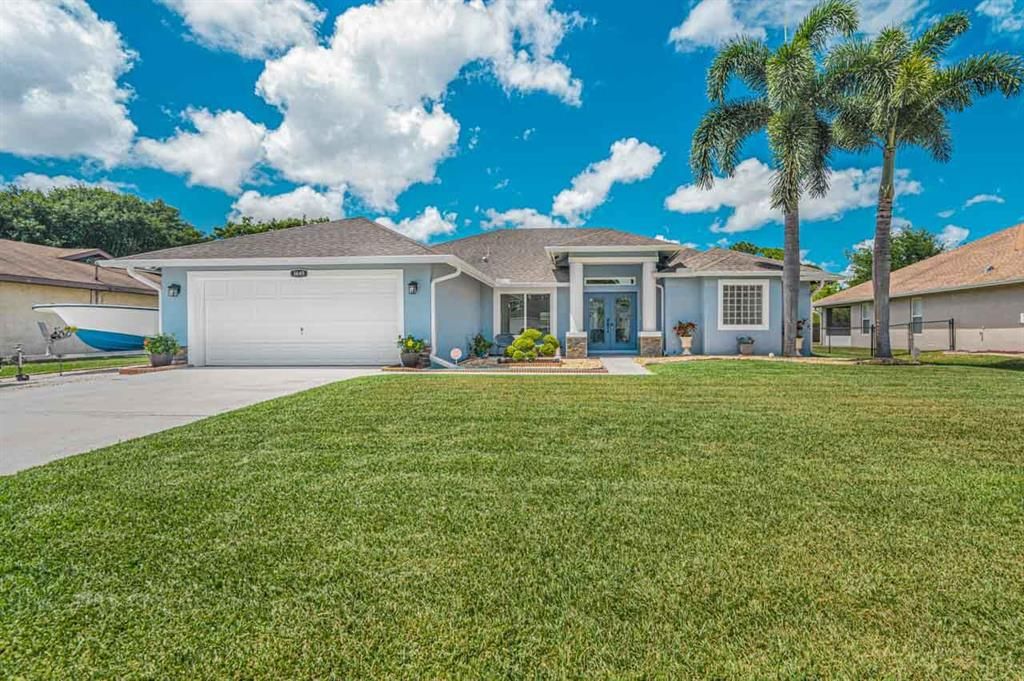 Photo of 1449 SW Santiago Avenue, Port Saint Lucie, FL 34953 (MLS # R10804310)