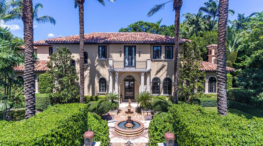 This magnificent gated Mediterranean home embodies the best of resort living in the estate section with deeded beach access and membership to Mar A Lago included. Thoughtfully executed floorplan built by Ecclestone Homes in 2002, this home offers spacious rooms, great closets, eat in kitchen, wood paneled library, wine room, beautiful loggia facing the pool with summer kitchen, 3 car spacious a/c garage. Many updates and renovations completed. Ready to be enjoyed this season.
