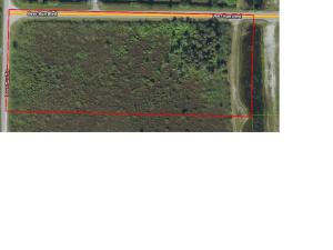 Corner lot in Equestrian country. Sign on Property