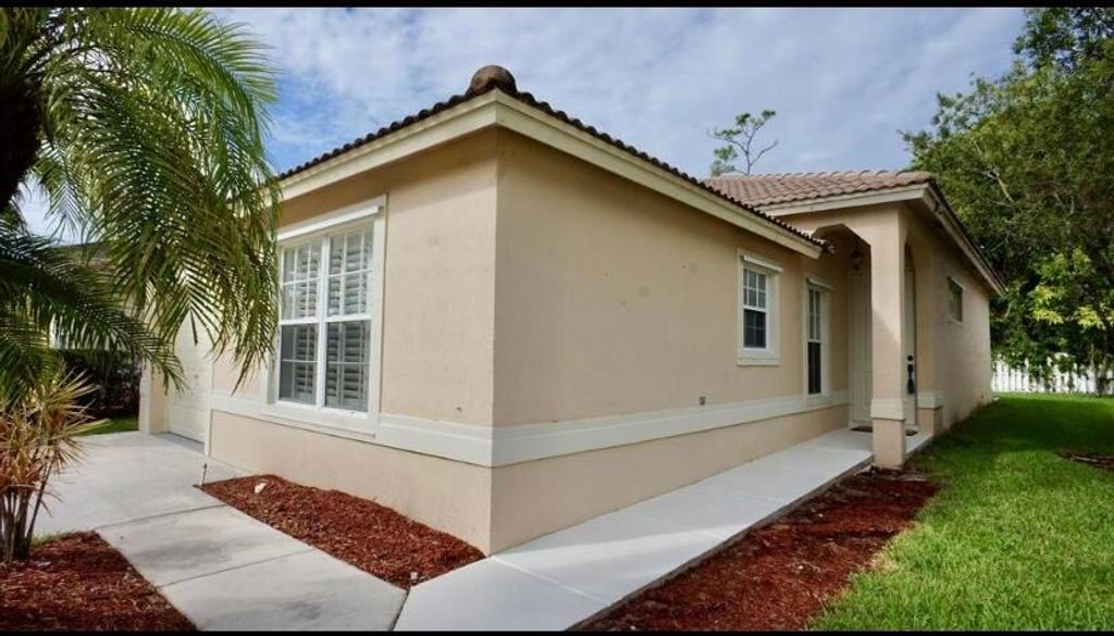 Photo of 145 Prestige Drive, Royal Palm Beach, FL 33411 (MLS # B26019674)