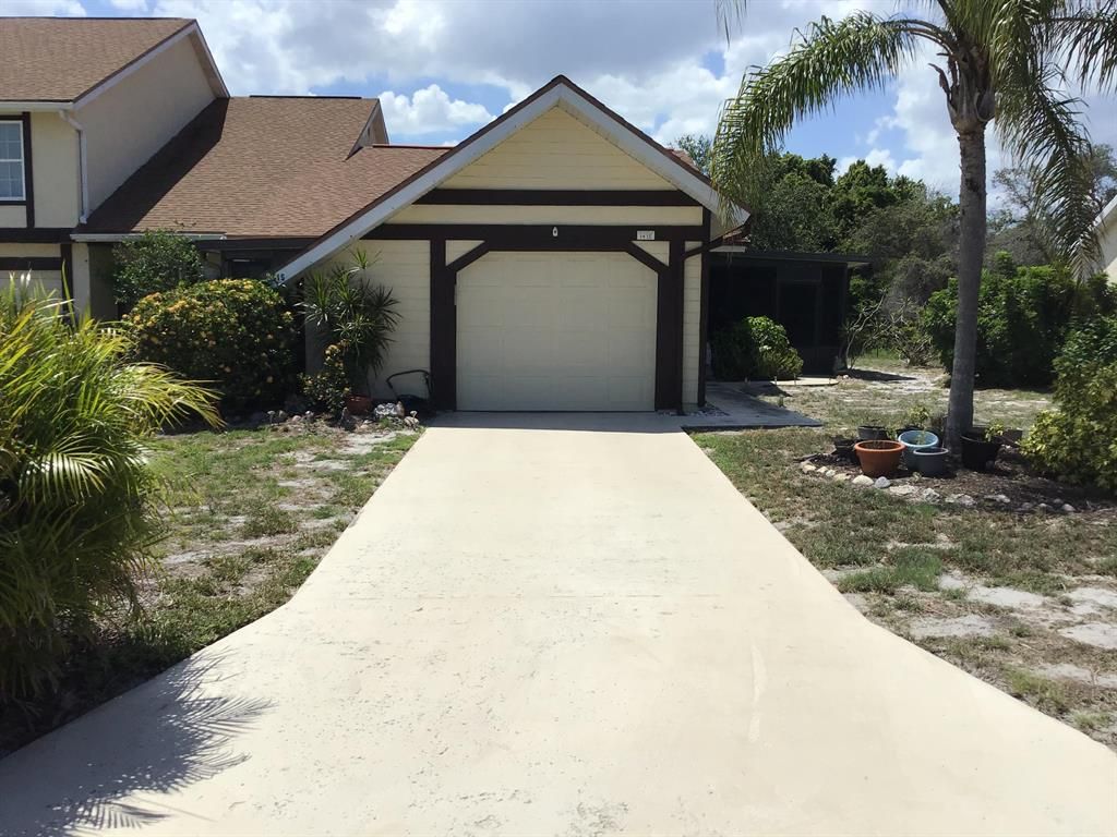 Photo of 1415 SE Larkwood Circle, Port Saint Lucie, FL 34952 (MLS # R10714240)