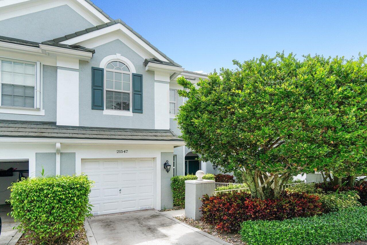 Nestled in the quaint Boca Raton community of Saint Andrews Grand, this townhome features 3 bedrooms, 2.1 baths, and a single-car garage. Featuring elegant flooring, lofty ceilings, a second-floor laundry facility, and enhanced by impact windows and sliders, the residence offers a serene garden vista visible from the kitchen extending through the first-floor living area. Ideally situated in proximity to the Town Center Mall, with convenient access to I-95 and just minutes away from parks and the picturesque beaches, this property combines comfort with convenience. Zoned for top rated school district.