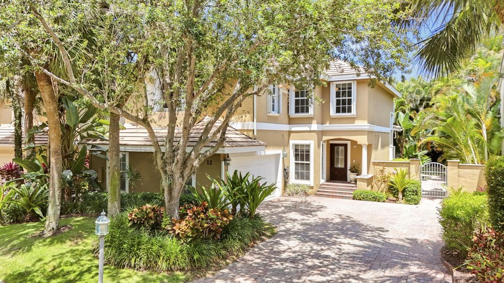 Photo of 12 Grand Bay Circle, Juno Beach, FL 33408 (MLS # B26029191)