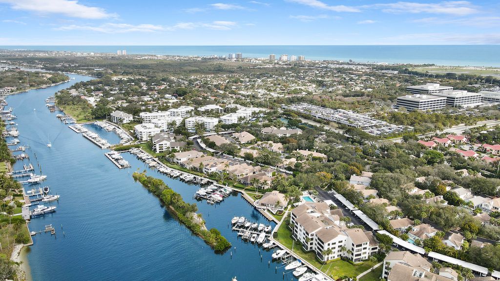 Photo of 12 Grand Bay Circle, Juno Beach, FL 33408 (MLS # B26029191)