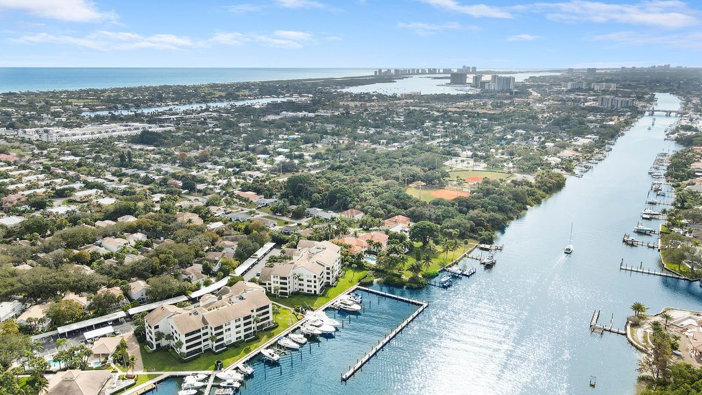Photo of 12 Grand Bay Circle, Juno Beach, FL 33408 (MLS # B26029191)