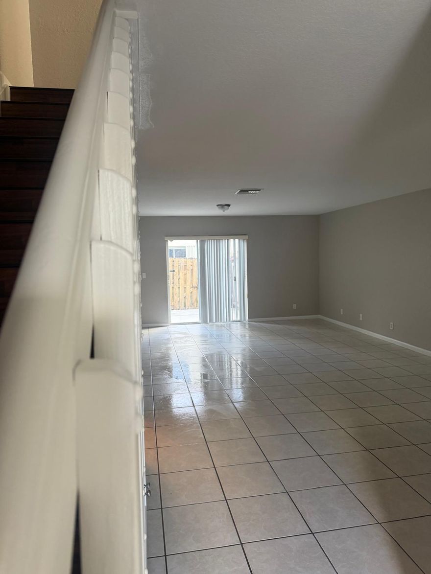 Beautifully maintained 3-bedroom, 2.5-bath townhome located in the heart of West Palm Beach! This move-in-ready home features tile flooring throughout the first floor, laminated wood flooring upstairs, and fresh paint throughout the entire interior.The open-concept kitchen flows seamlessly into the living and dining areas, creating a bright and inviting space for everyday living and entertaining. Enjoy outdoor relaxation in your private fenced patio. The HOA offers outstanding value, covering access to the community pool, children's playground, exterior building insurance, and front-yard landscaping. NEW ROOF! Exceptional Value in West Palm Beach Conveniently located near shopping, dining, beaches, downtown West Palm Beach, and Palm Beach International Airport. With no rental restriction.