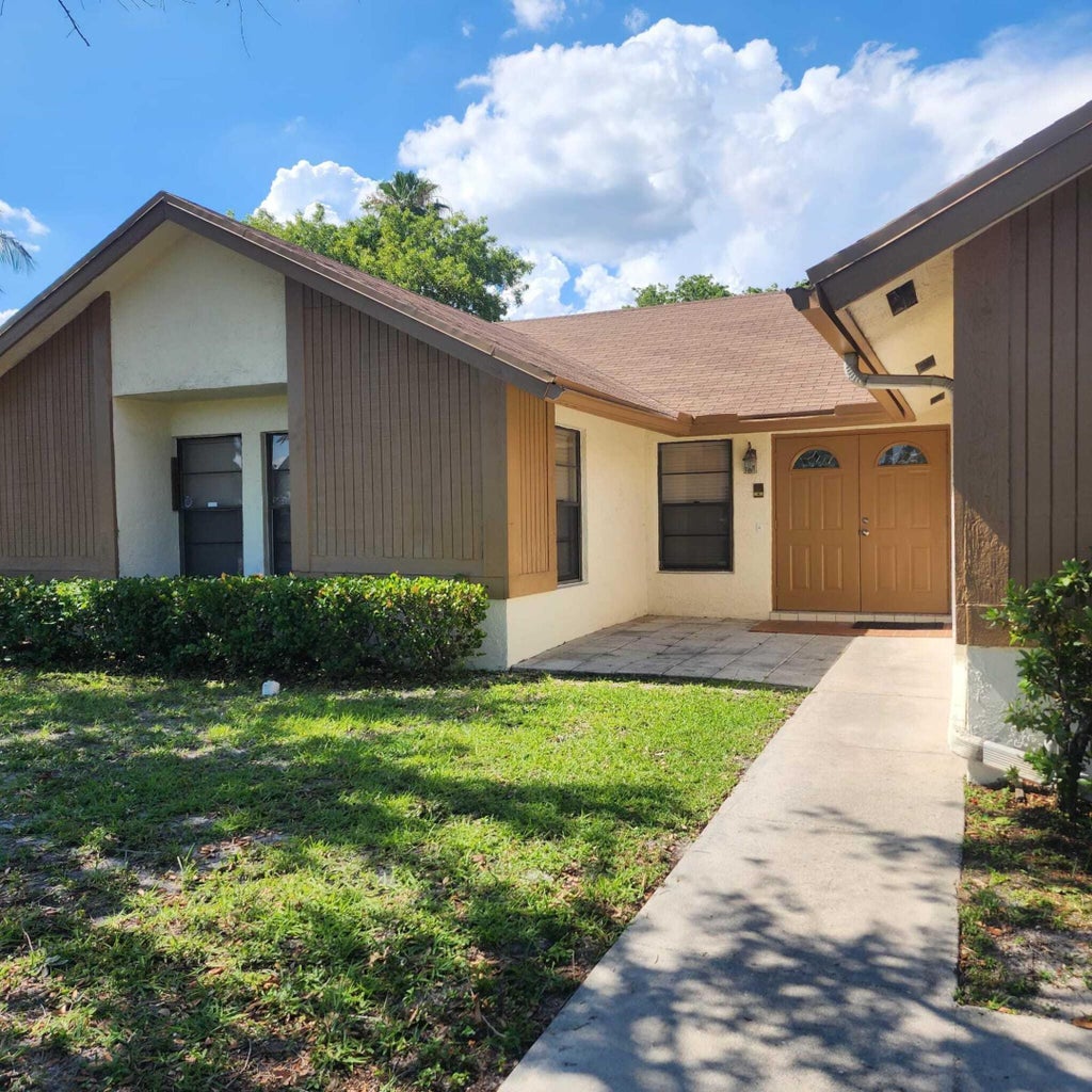 Photo of 9915 NW 41st Court #9915, Sunrise, FL 33351 (MLS # B26028801)