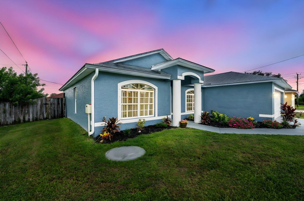 Photo of 2014 SW Trenton Lane, Port Saint Lucie, FL 34984 (MLS # R11116148)