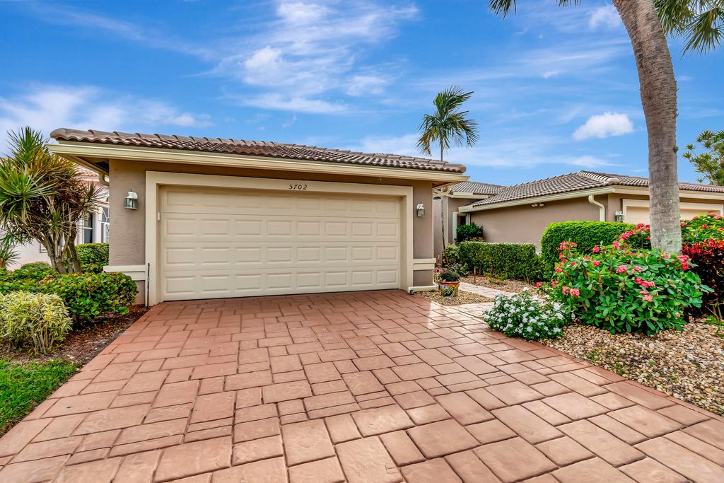 Photo of 5702 Emerald Cay Terrace, Boynton Beach, FL 33437 (MLS # R10942893)