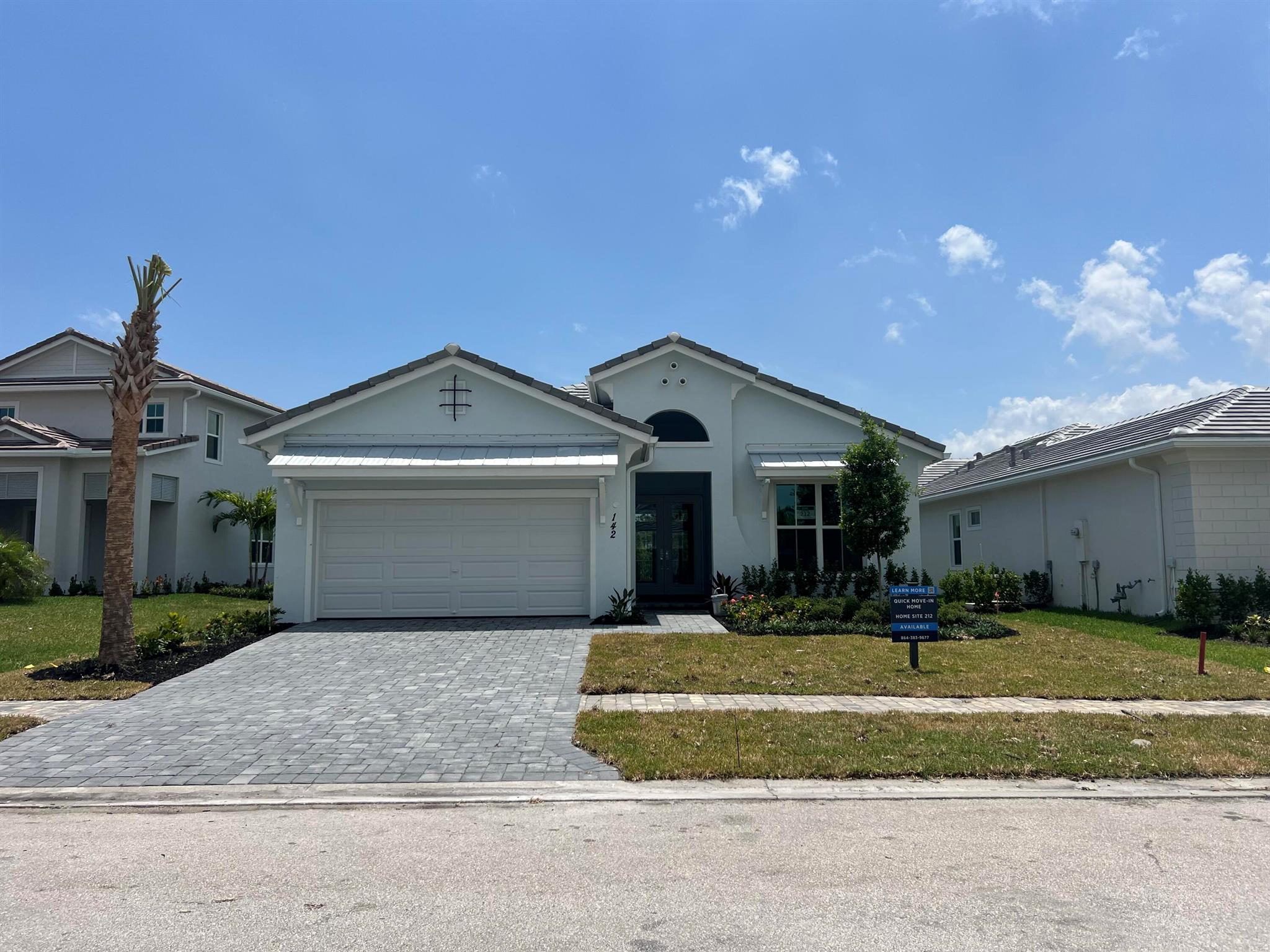 This elegant 3-bedroom, 2.5-bathroom home is in the prestigious Tom Watson-designed golf course section of the sought-after Tesoro Club. Designed for luxury and privacy, it features an oversized primary suite with serene preserve views and a custom pool. The open-concept layout boasts tray ceilings, while the chef's kitchen includes a 5-burner gas range, stainless steel appliances, and quartz countertops. Porcelain flooring flows through the main areas and primary suite. Impact-rated windows and doors fill the home with natural light. Currently under construction, completion is expected by July 2025.