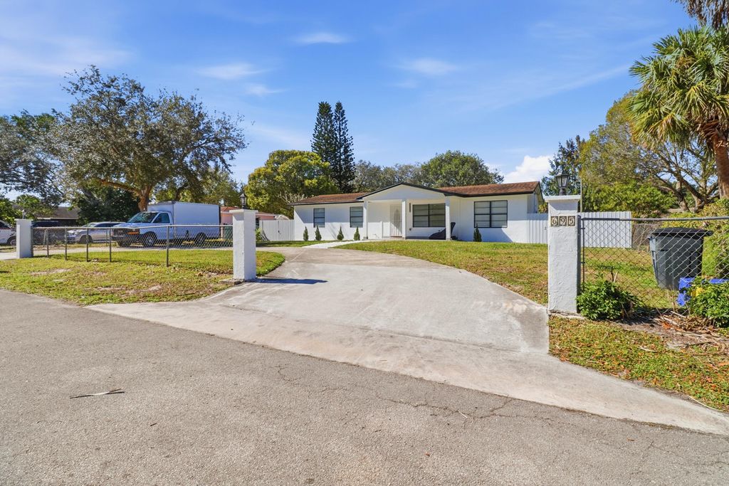 Photo of 695 Dixie Lane, West Palm Beach, FL 33415 (MLS # R11164256)