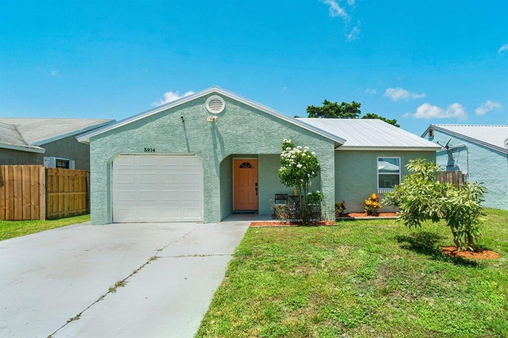 Photo of 5914 SE Mitzi Lane Ln, Stuart, FL 34997 (MLS # R10819677)