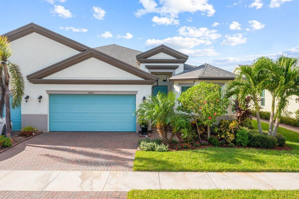 Photo of 12851 SW Lake Fern Circle, Port Saint Lucie, FL 34987 (MLS # R11033528)