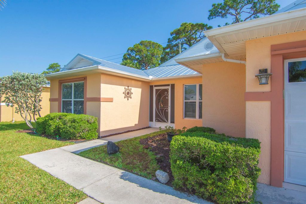 Photo of 14112 Aguila Ave, Fort Pierce, FL 34951 (MLS # R10988533)