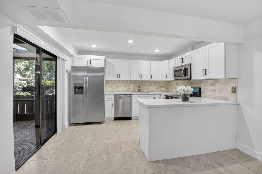 Photo of 717 NW 29th Avenue #B, Delray Beach, FL 33445 (MLS # B26006950)