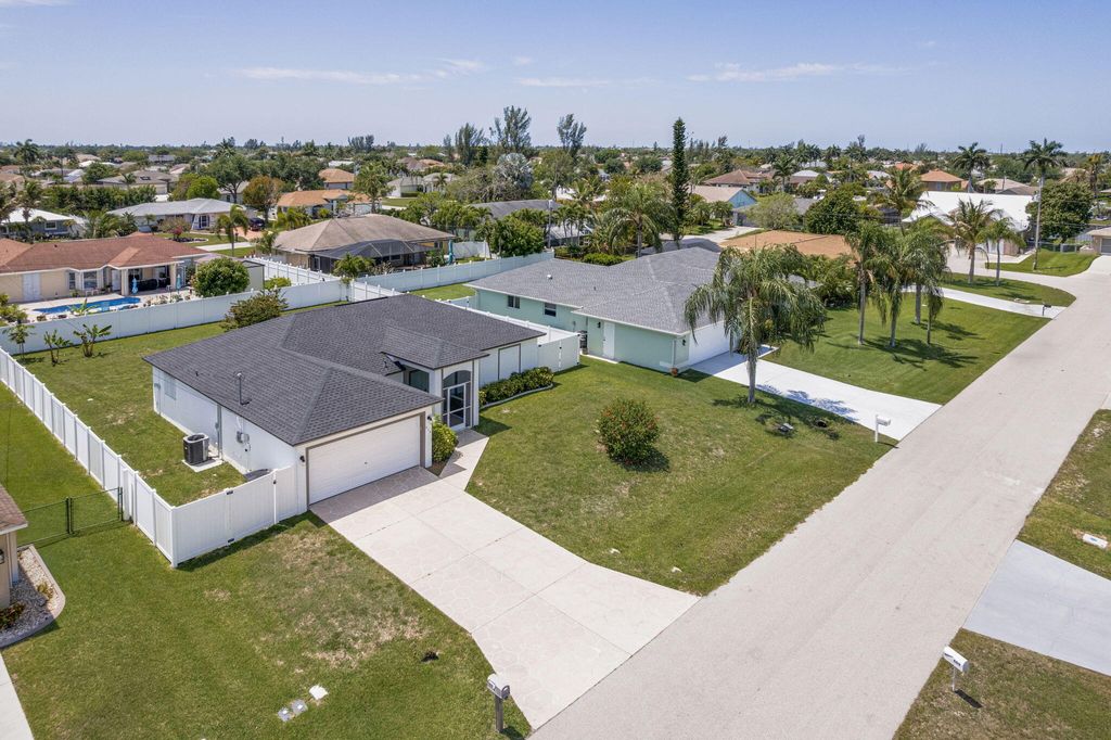 Photo of 610 SE 21st Lane, Cape Coral, FL 33990 (MLS # B26015359)