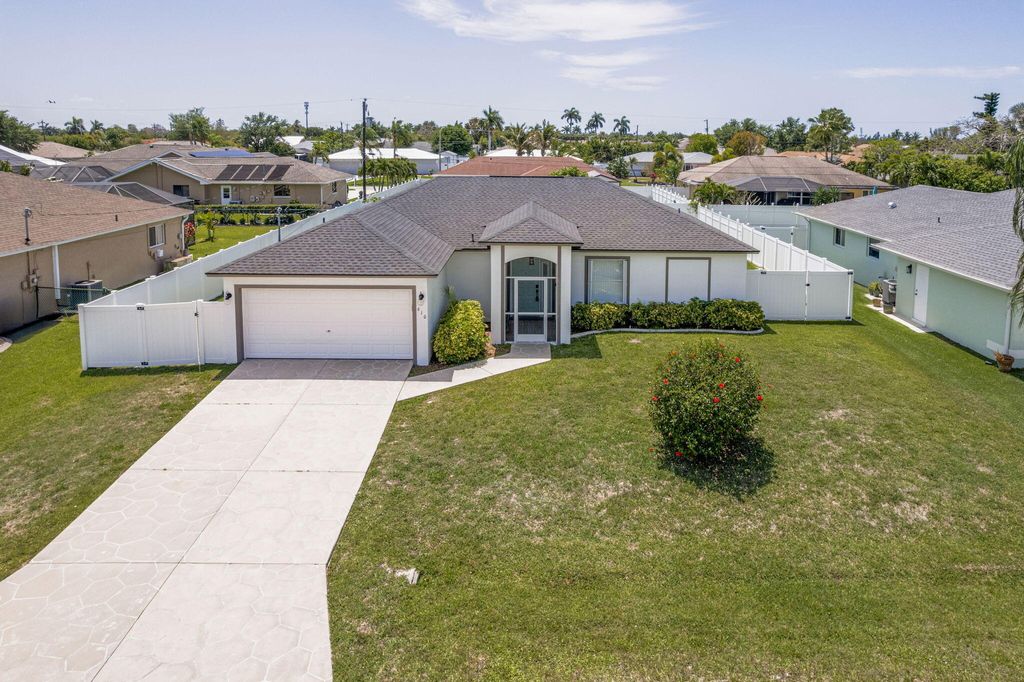 Photo of 610 SE 21st Lane, Cape Coral, FL 33990 (MLS # B26015359)