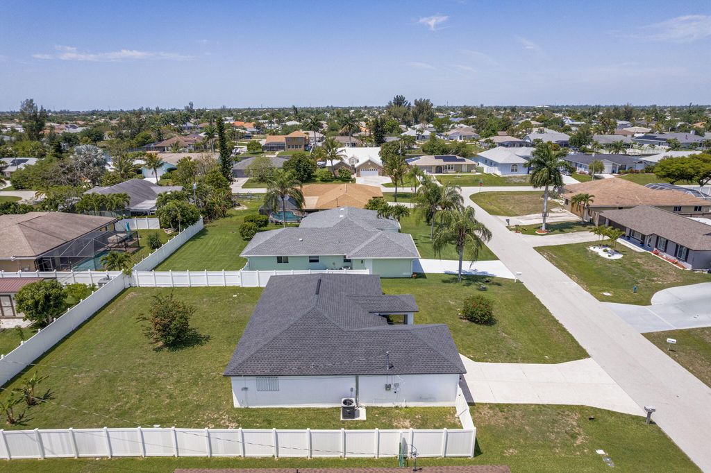 Photo of 610 SE 21st Lane, Cape Coral, FL 33990 (MLS # B26015359)