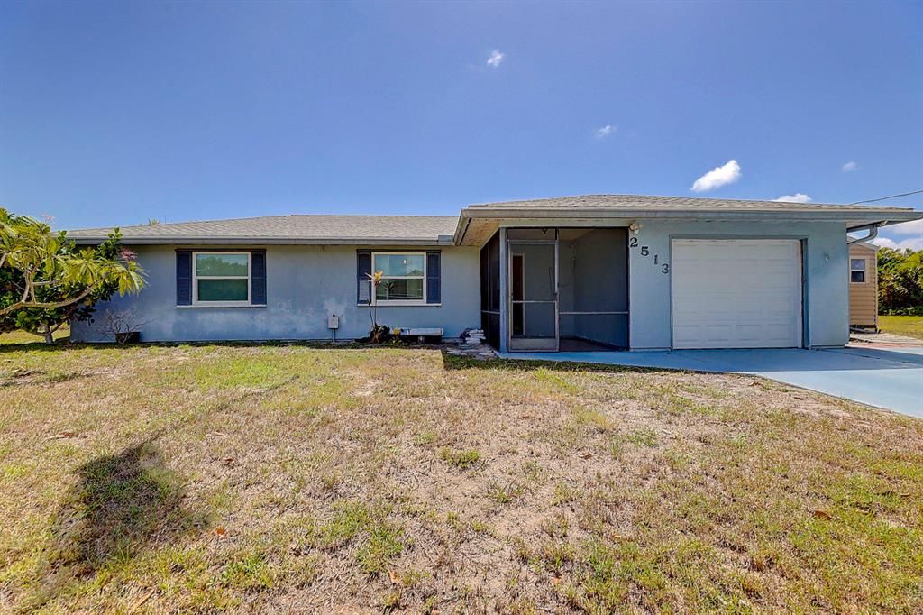 Photo of 2513 SE Hallahan Street St, Port St Lucie, FL 34952 (MLS # R10821426)