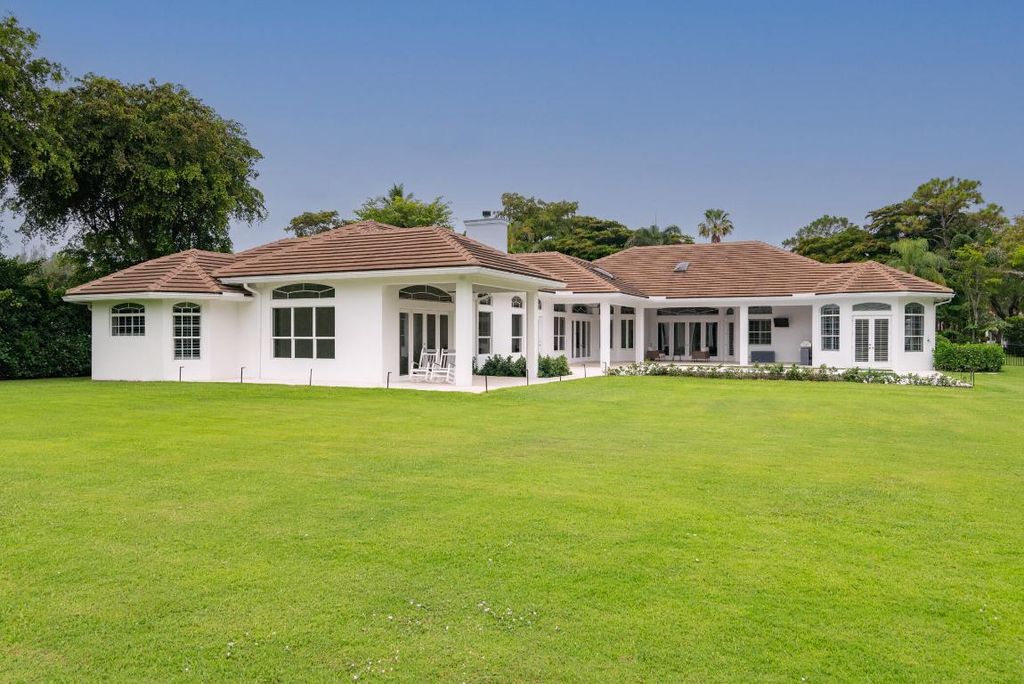 Photo of 8246 Man O War Road, Palm Beach Gardens, FL 33418 (MLS # R11096789)