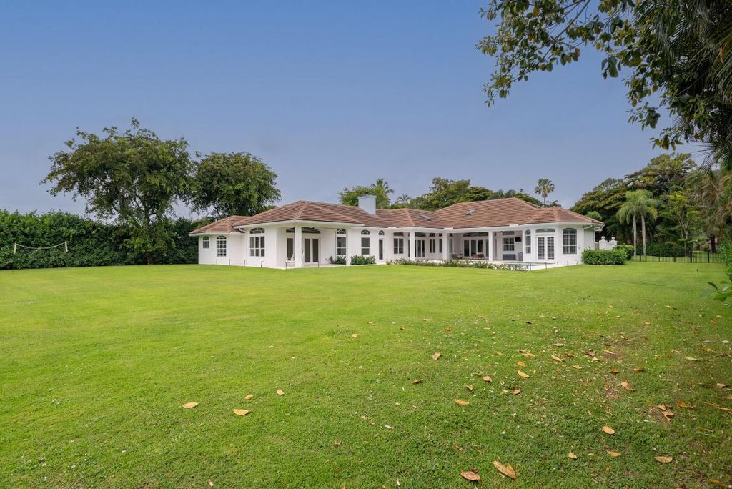 Photo of 8246 Man O War Road, Palm Beach Gardens, FL 33418 (MLS # R11096789)