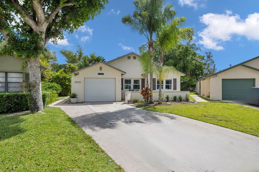 Experience the perfect blend of comfort, style, and location in this 3 BD 2BTH pool home in the Pine Springs community of Boca Raton. Features include open and bright floor plan, with tile floors throughout, stylish updated-kitchen with white shaker cabinets, quartz countertops, SS appliances, oversized master-suite w/ walk-closet and double vanity master bath, tile floors throughout and all impact windows The XL corner lot has fenced-in backyard, sparkling pool, lush landscaping, and covered patio. $180/month HOA fee includes lawn care, community lawn sprinkling, lakefront community pool and clubhouse. Conveniently located near top-rated schools, shopping, dining and easy access to major highways,  gorgeous area beaches, FLL & PBI international airports.